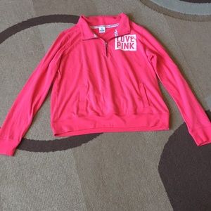 Pink sweatshirt.